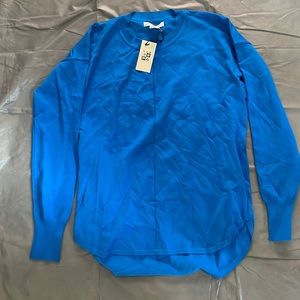 Blue knit sweater, never worn and tag on